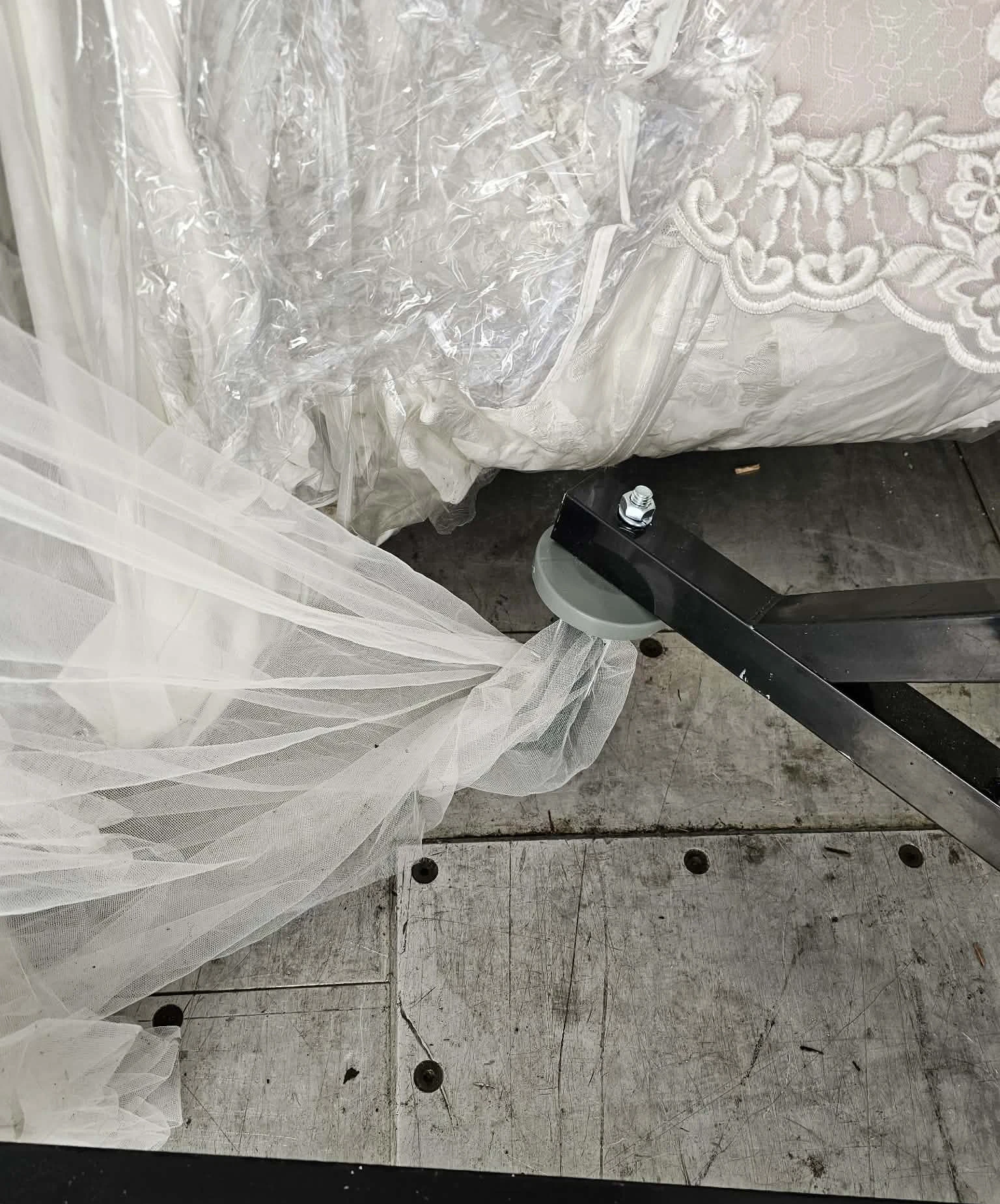 Gown dragging near rack wheel on truck floor