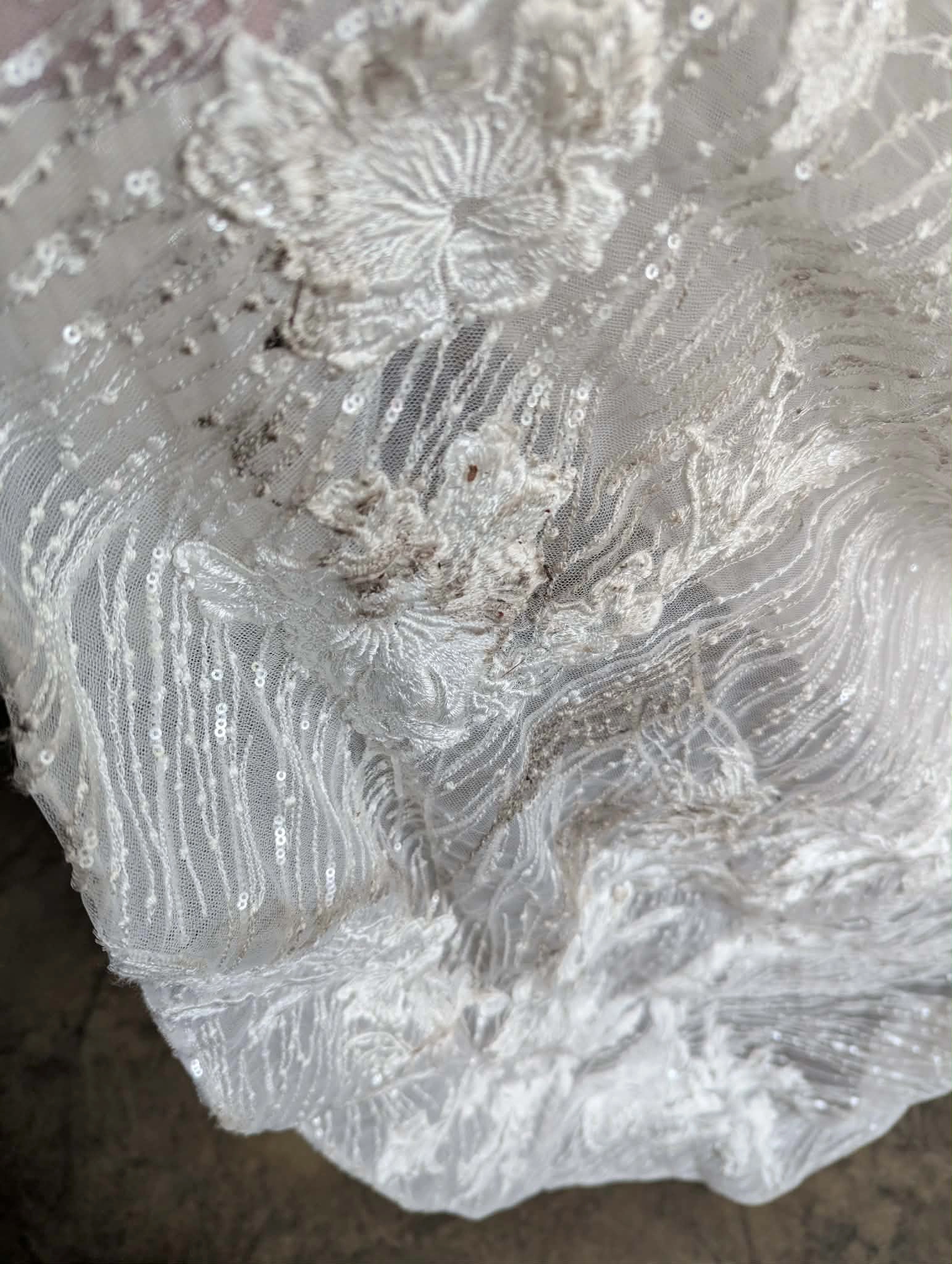 Damaged sequined fabric detail