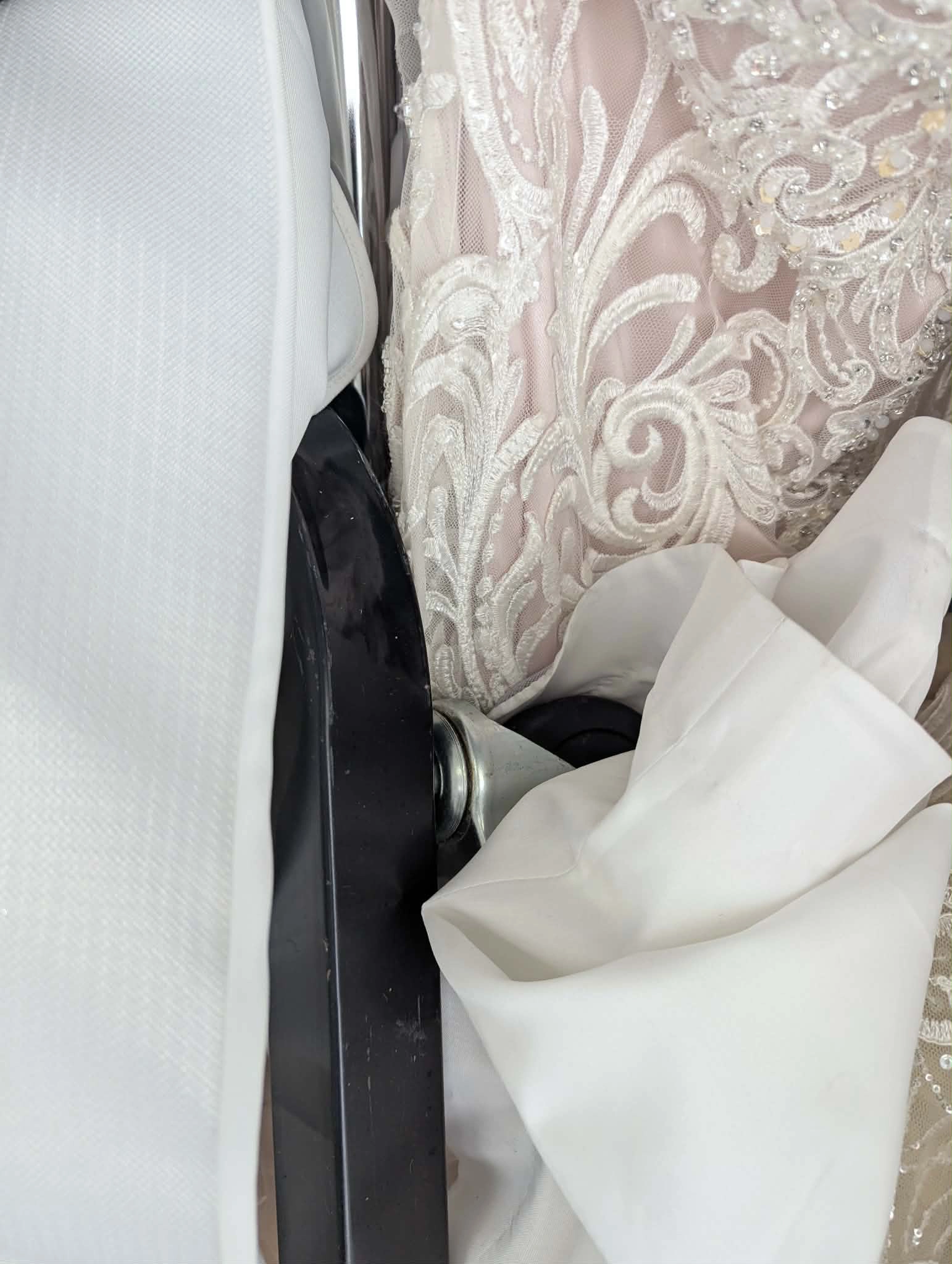 Gown pressed against truck wall and rack