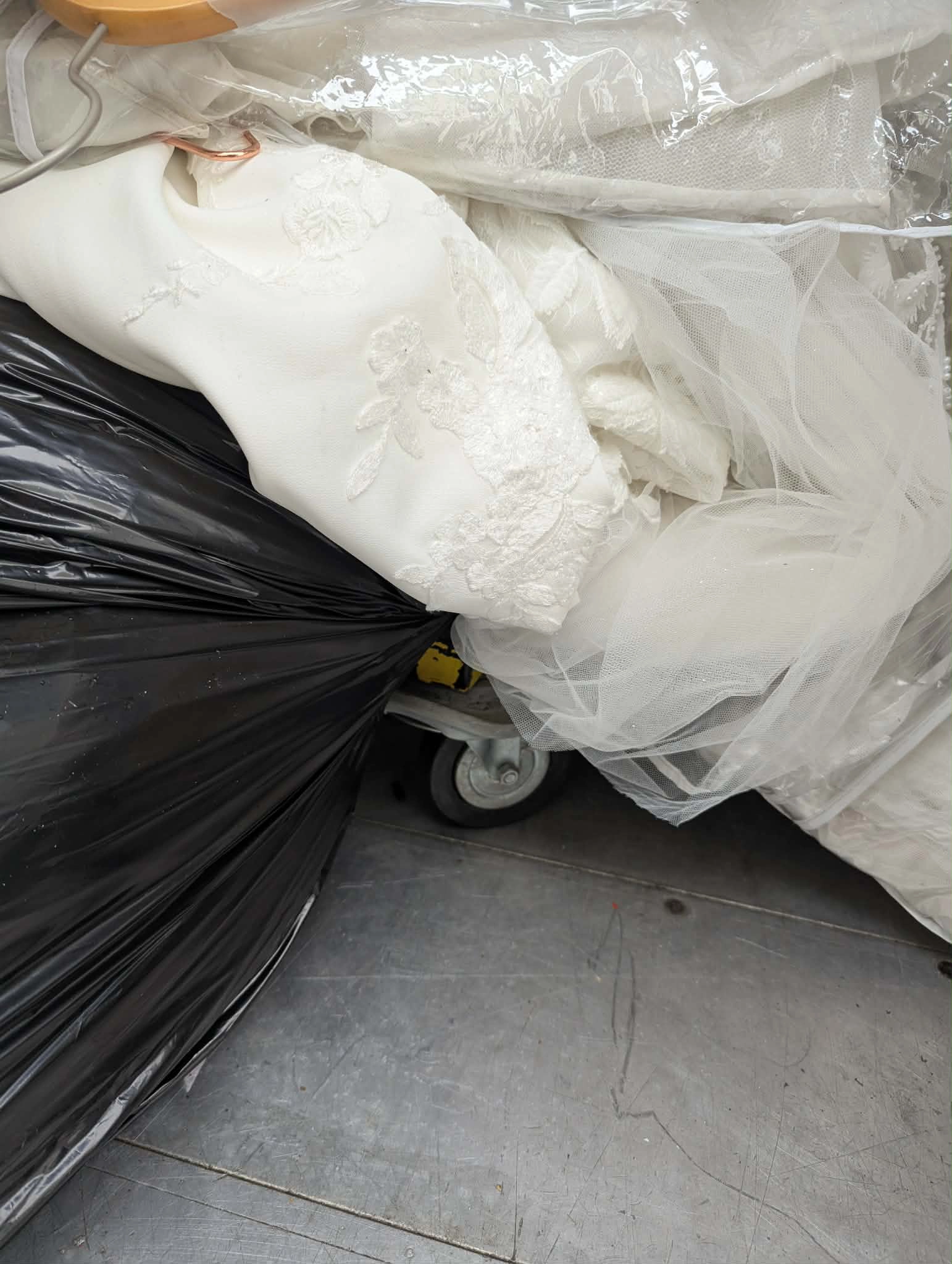 Gown fallen onto truck floor near wheel